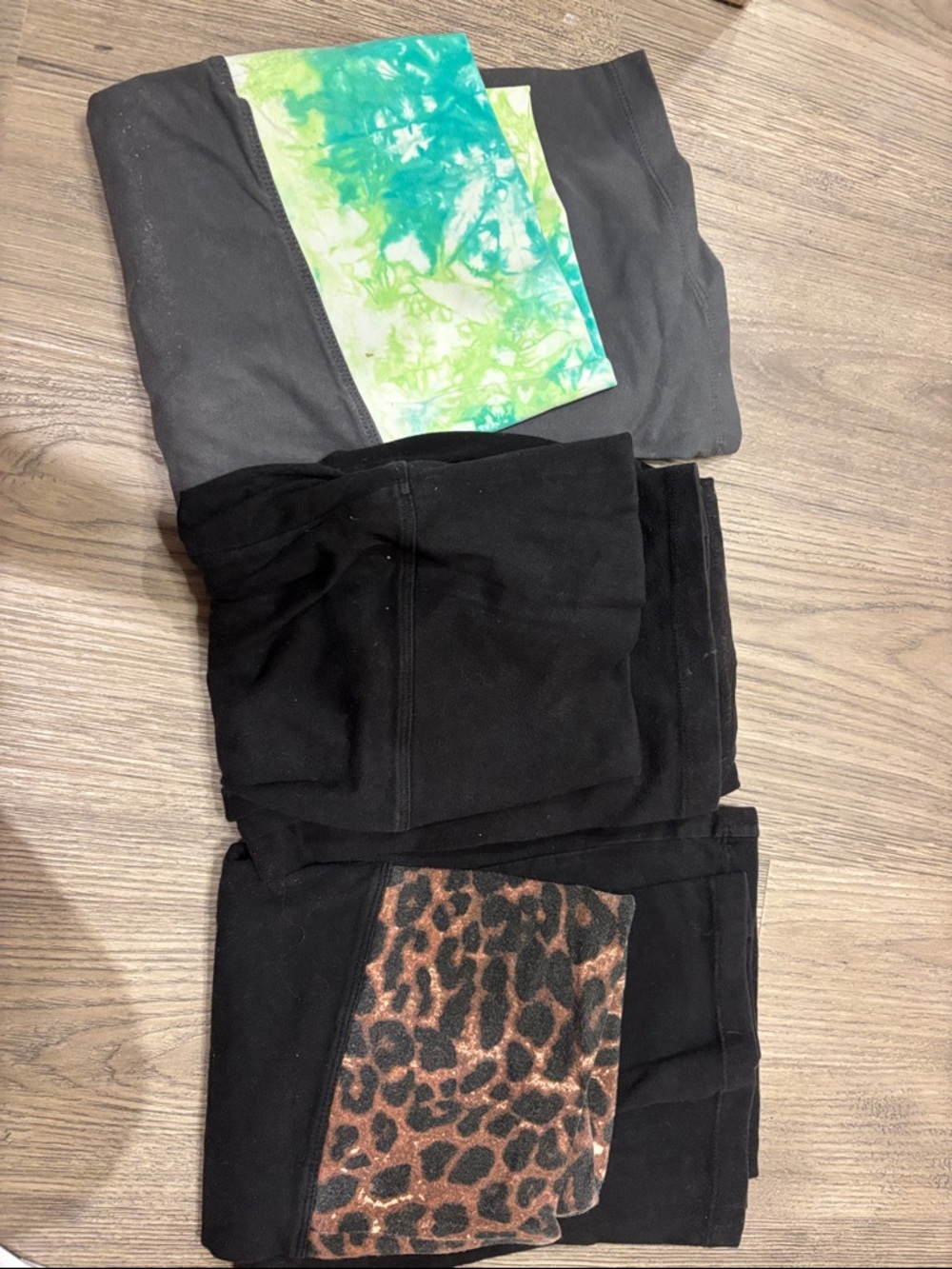 Three pairs of Victoria secret fold over flare leggings